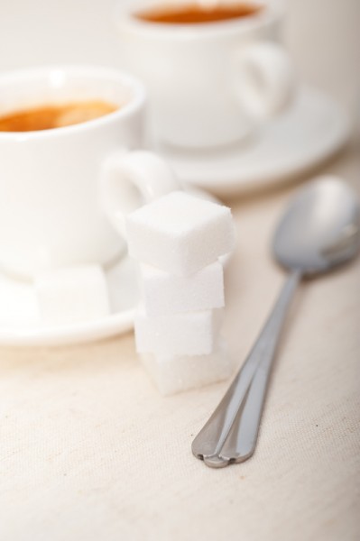 Italian espresso coffee and sugar cubes