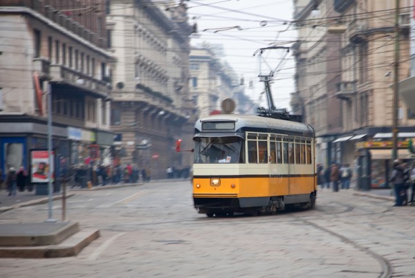 Vintage tram on the city street with motion blur