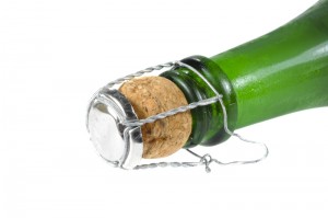 Macro shot of a Champagne bottle on white background