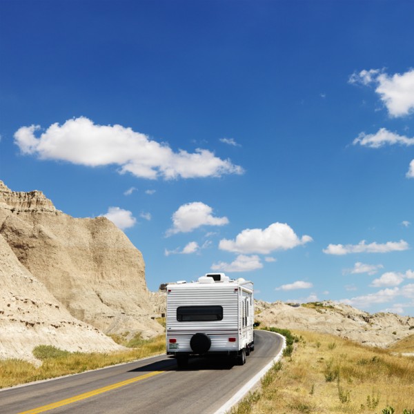 Camper on scenic road.