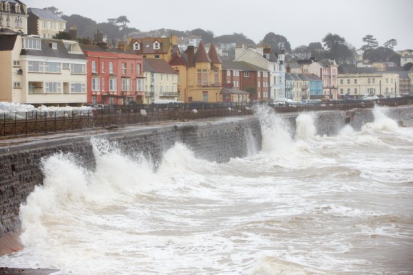 Large Waves Breaking Against Sea Wall At Dawlish In Devon