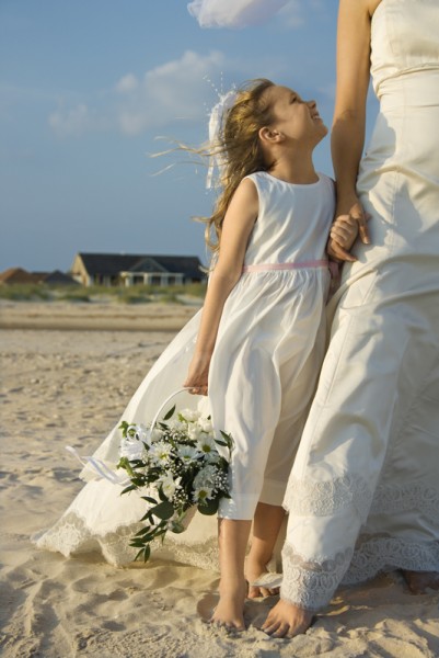 Bride and Flower Girl on Beach